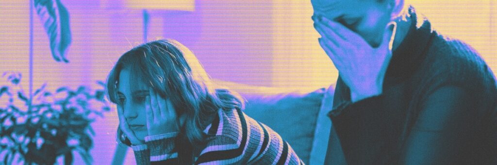 dejected mom with her upset child