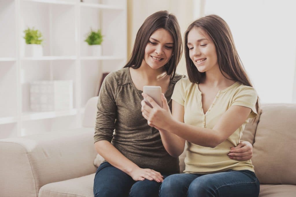 Mother and daughter with Gabb cell phone for kids