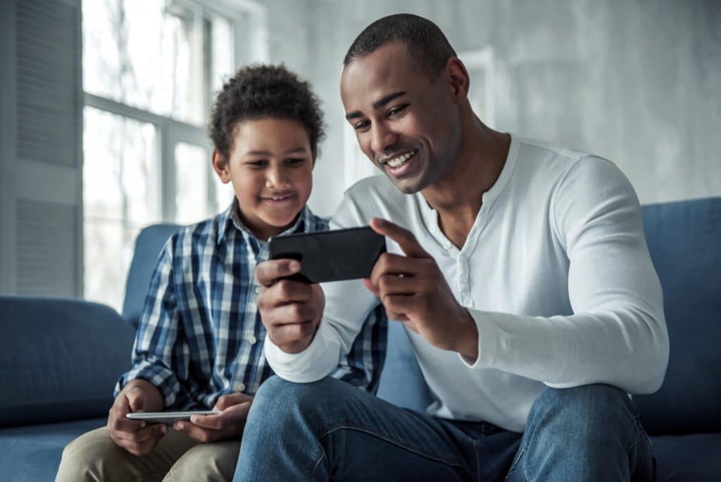 Father and son on phone