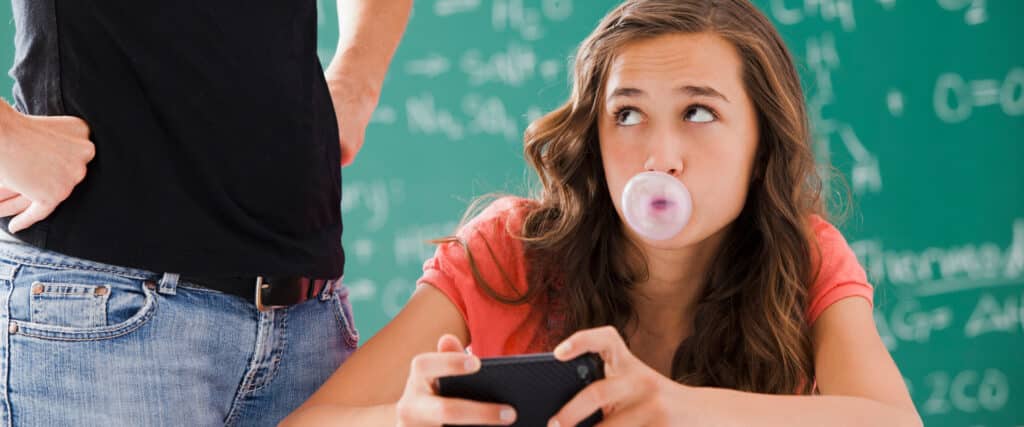 distracted teen girl at school