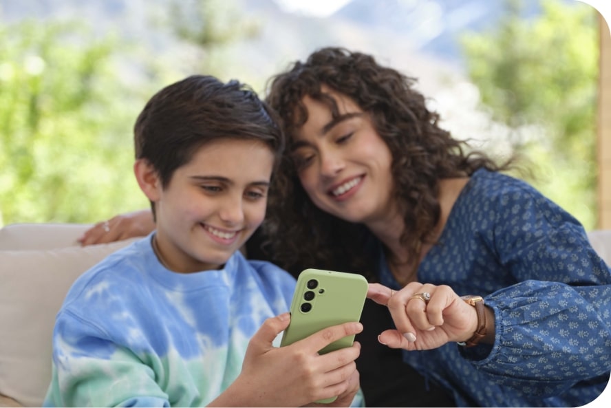 mother and son smiling at gabb safe phone for kids