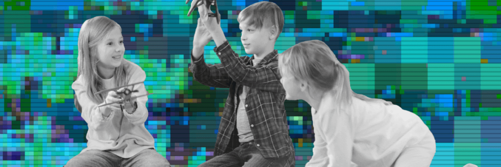 little kids playing with toy airplanes