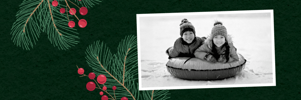 smiling kids snow sledding on festive background