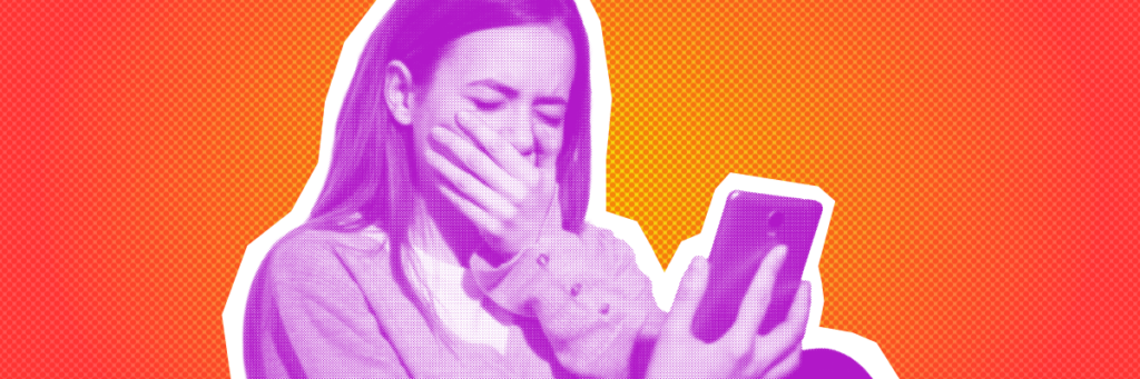 girl looking upset with hand over her mouth after looking at the smartphone in her hands