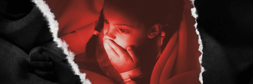 child looking at a screen under a blanket covering their mouth