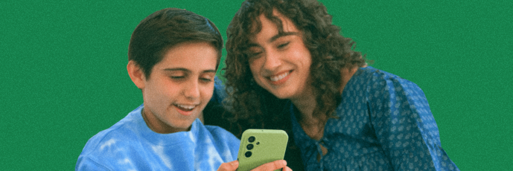 mom and son smiling at his Gabb smartphone