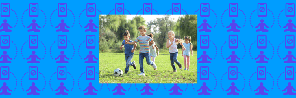 little kids smiling playing soccer