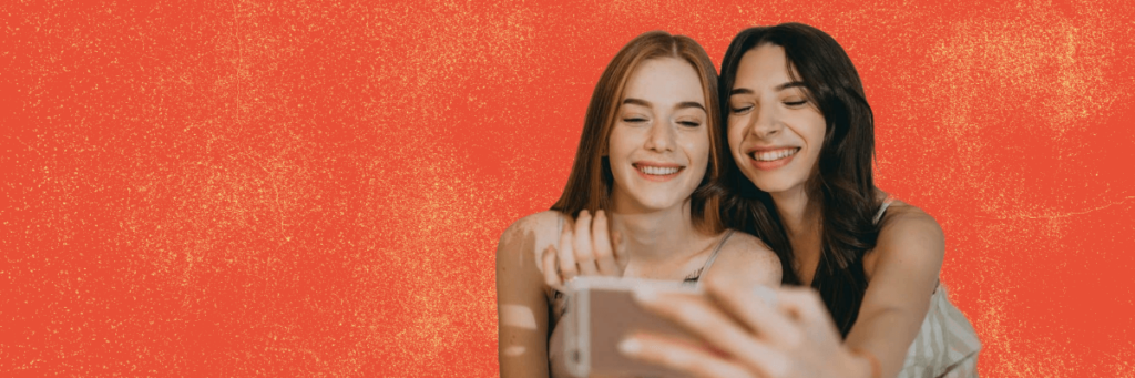 two teen girls taking a selfie