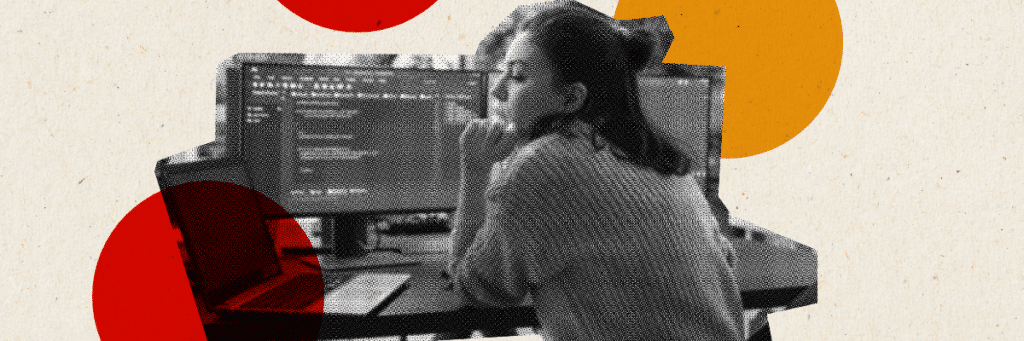 girl looking at laptop and monitor screens