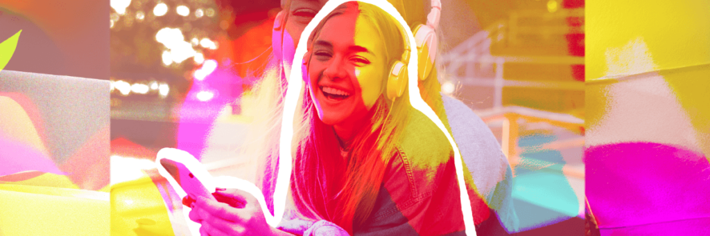happy teen in technicolor with smartphone for kids