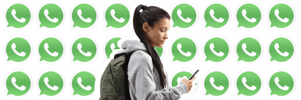 teen girl looking at whatsapp on her smartphone