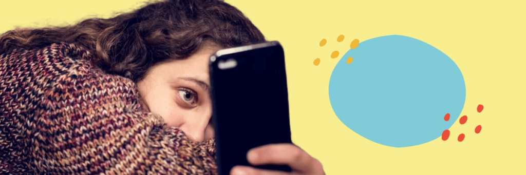 teen girl looking at her phone