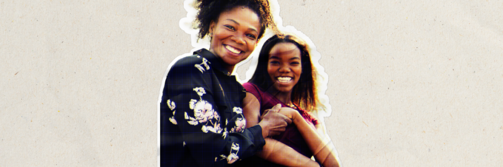 mom smiling with her teen daughter