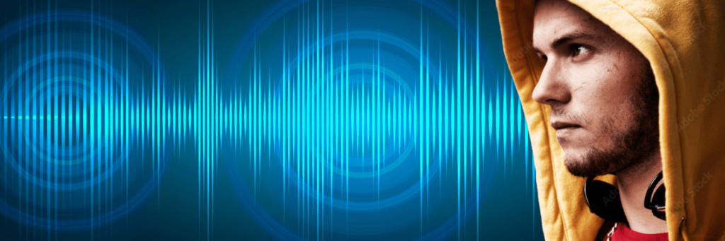 person with hood and audio